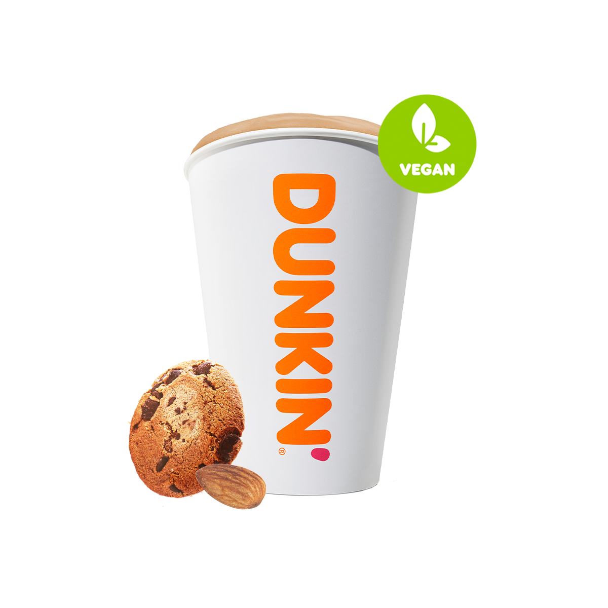 Ein weißer Becher mit der Aufschrift "DUNKIN!" steht neben einem Schokoladenkeks und einer Mandel, mit dem Hinweis "VEGAN".